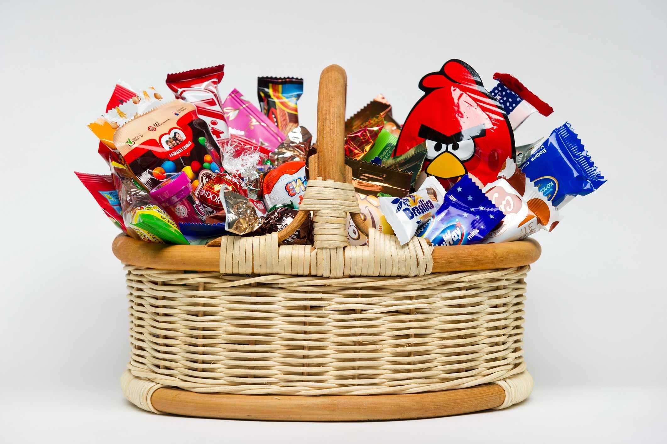A basket filled with movie night snacks