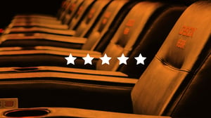 D-BOX chairs with 5 stars across them to demonstrate a 5-star review.