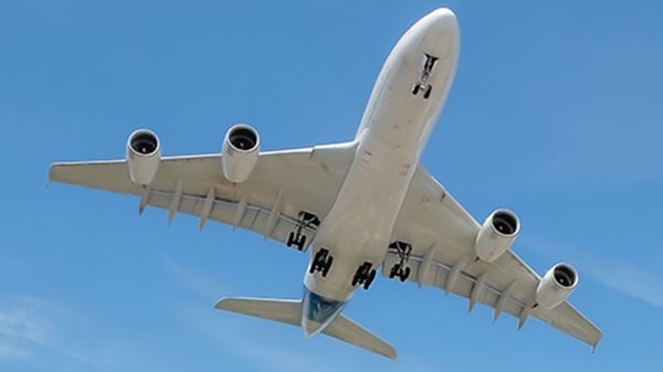 A plane flying in the sky.