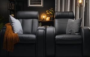 Two D-BOX haptic chairs in a living room