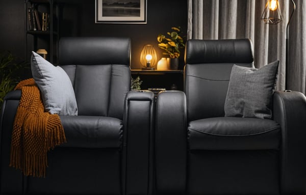 Two D-BOX haptic chairs in a living room