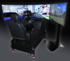 Driving simulator with screen showing a city